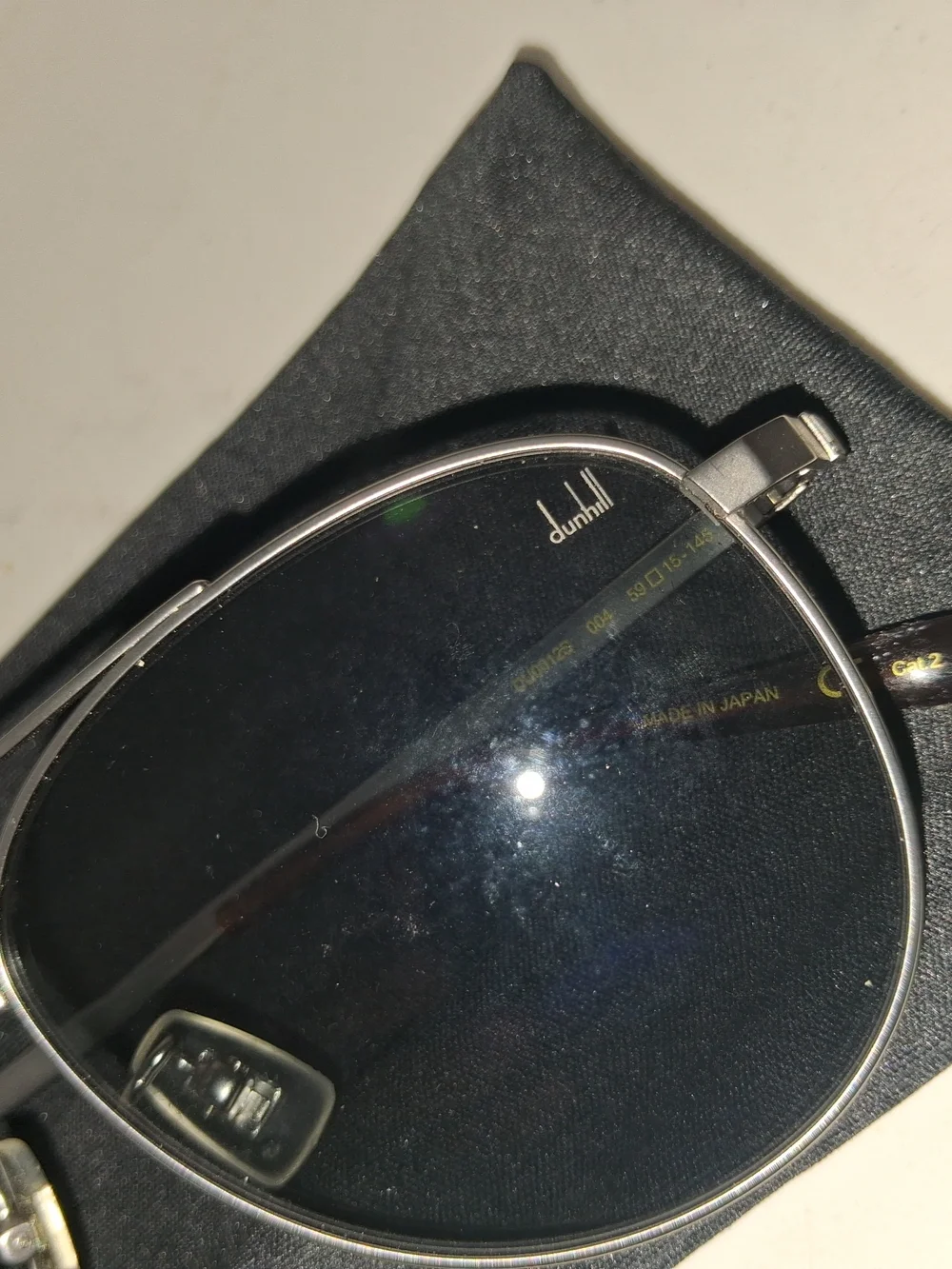 Dunhill Aviator Sunglasses showcases a classic double-bridge metal frame paired